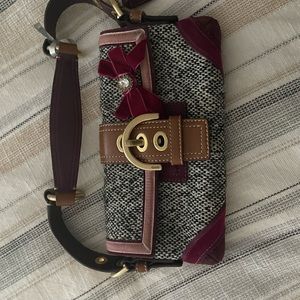 Coach clutch with strap